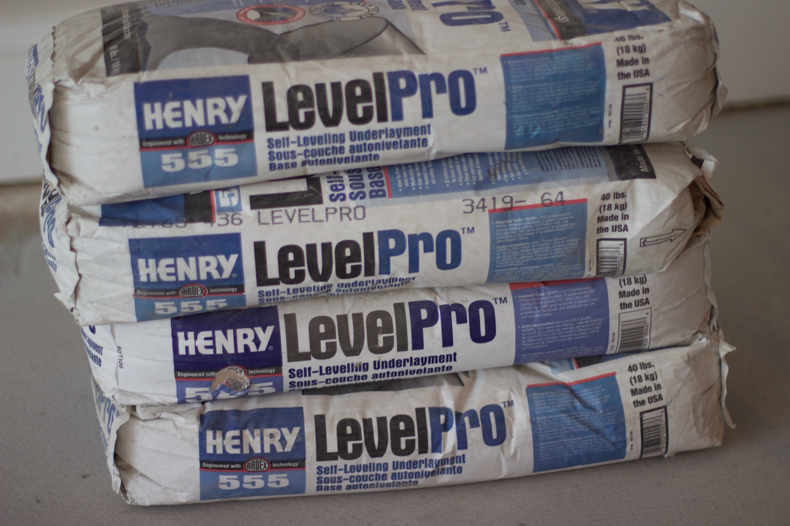Where can you find inexpensive self-leveling compound for a concrete floor?