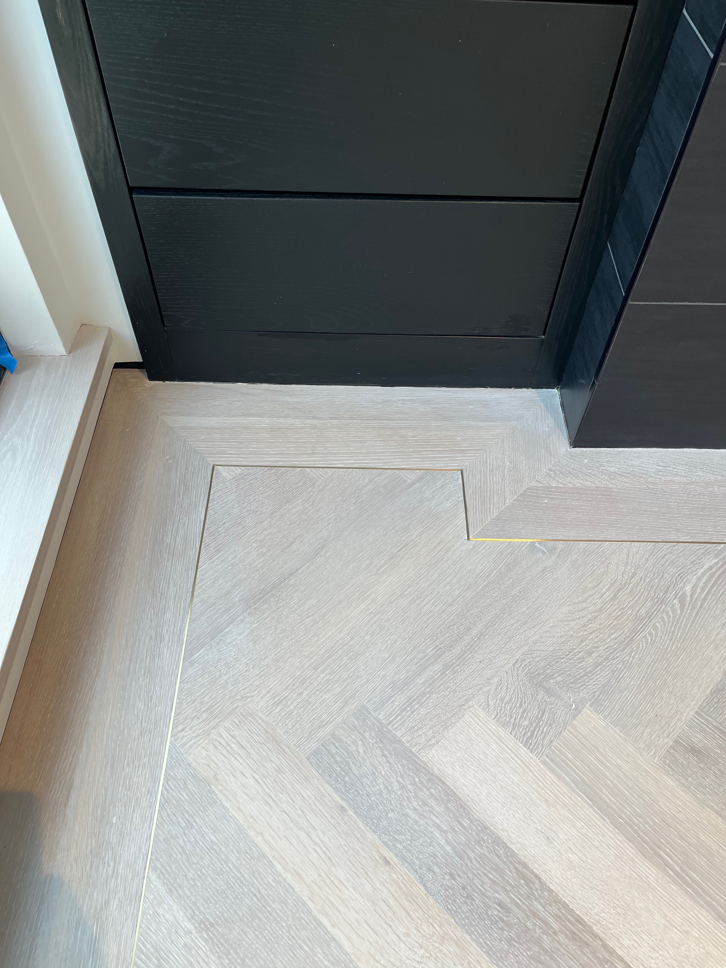 hardwood flooring brass inlay